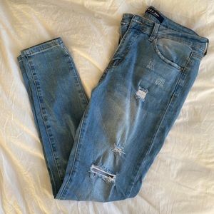 High Rise Distressed Wax Jeans - Skinny